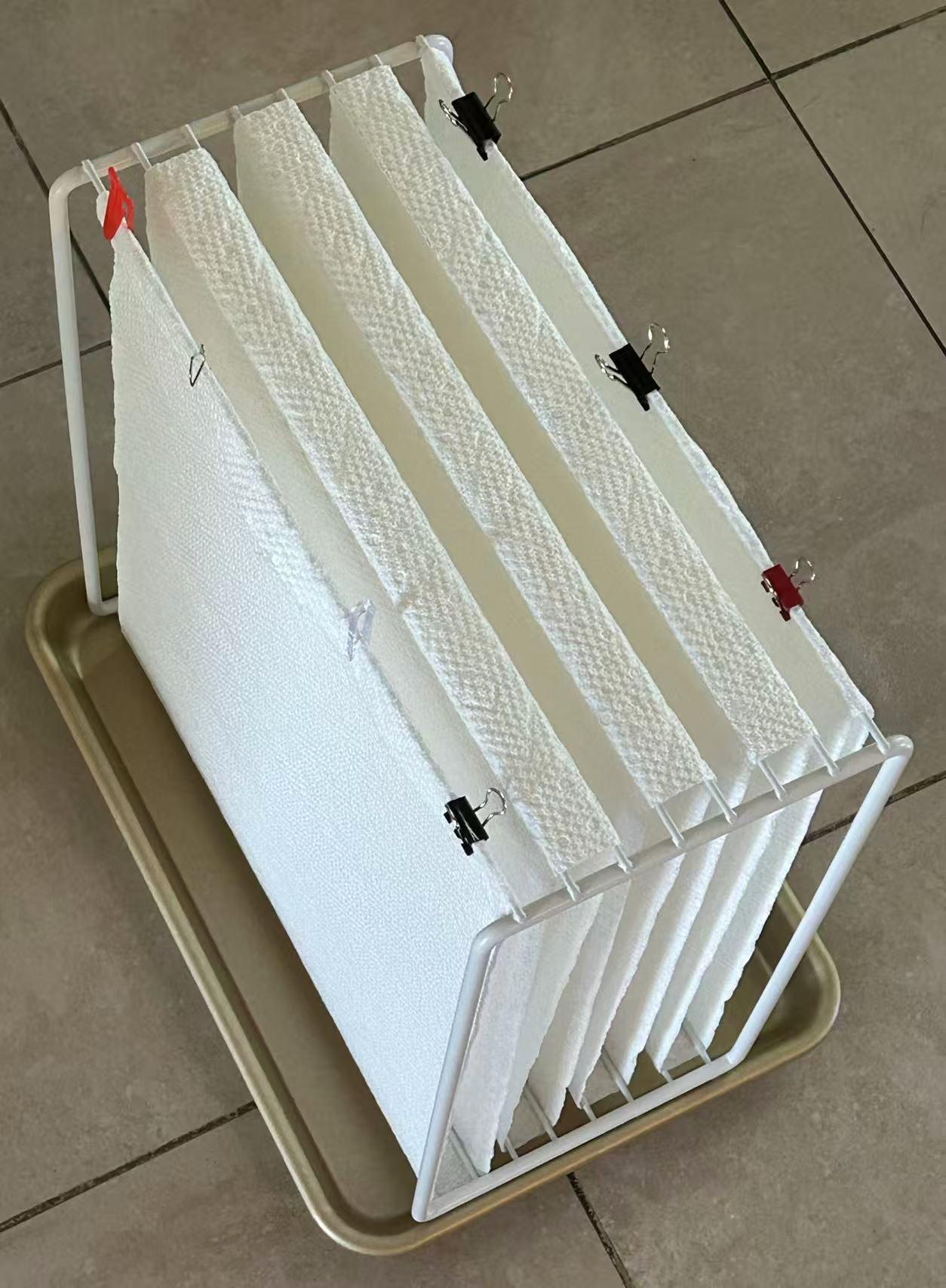 Kitchen paper towels as wicks (not included)